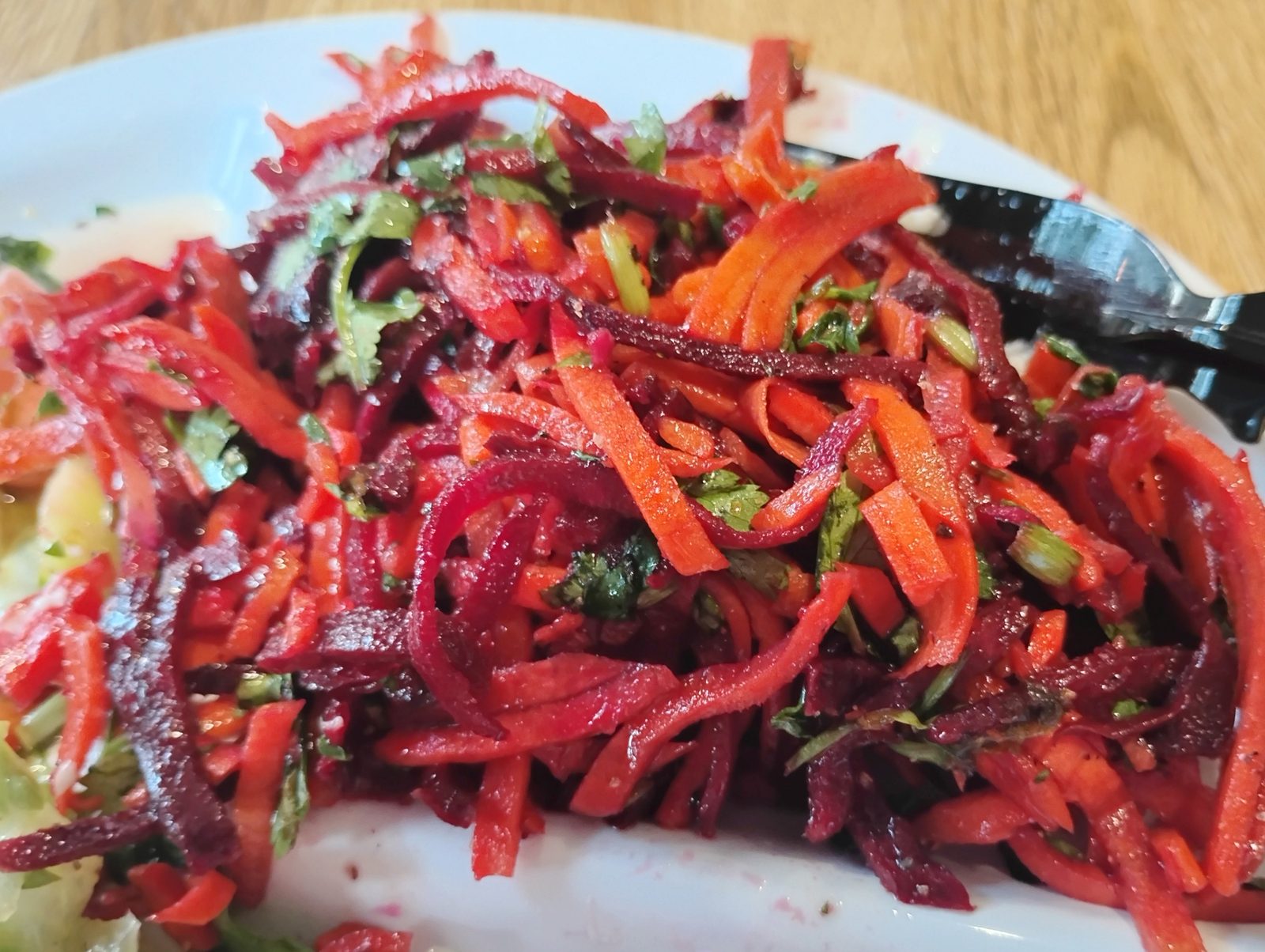Shredded beet and carrot salad with cilantro